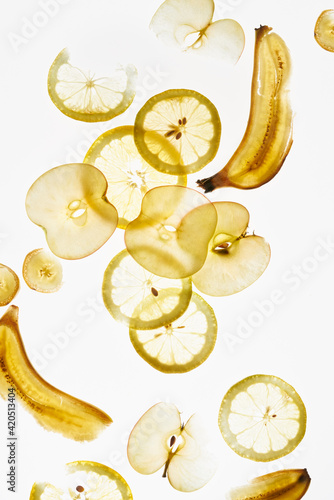 Apple, banana and Lemon slices photo