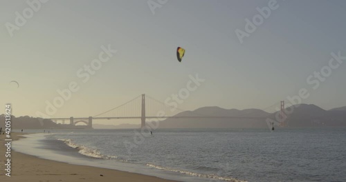 Kitesurfing in San Francisco bay at sunset
