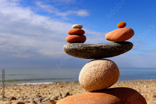 concept of life balance and harmony. Balance stones against the sea.