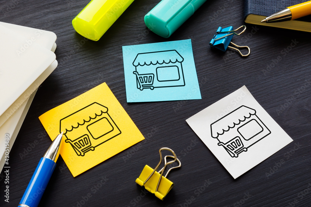 Franchise of stores concept. Memo sticks on the desk. Franchise of stores concept. Memo sticks on the desk.