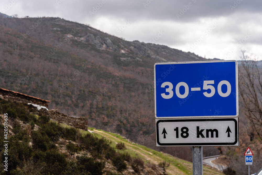 Traffic Signs in Mountain Road. Safety Concept. Traffic Signs in Mountain Road. Safety Concept.