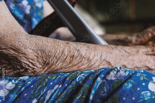 Grandmother relaxing inside photo