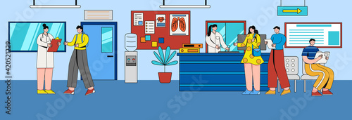 People stand in the corridor of the hospital