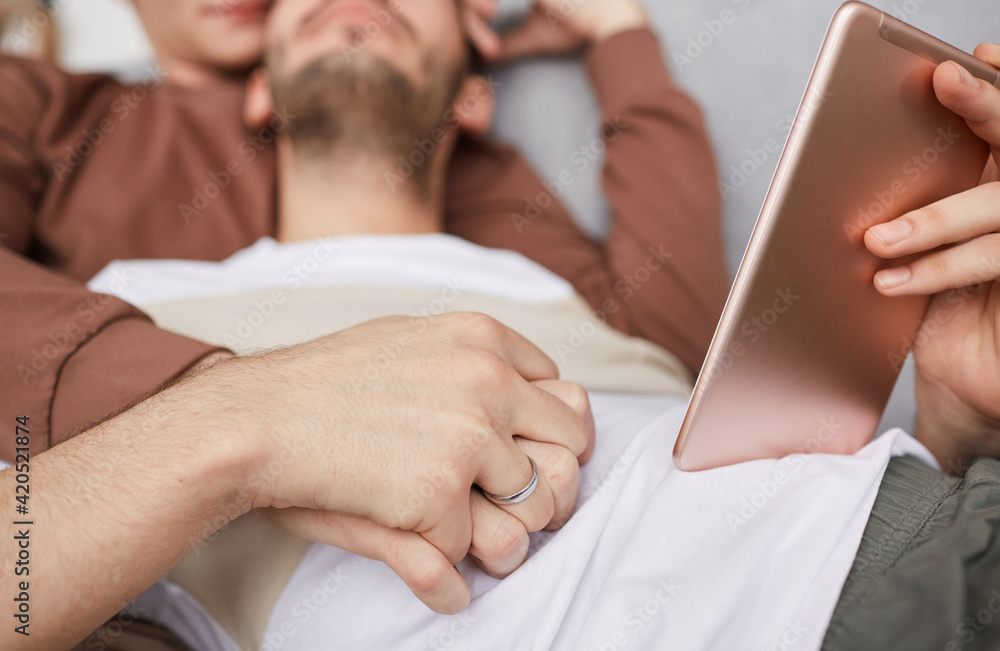 Happy Gay Couple Holding Hands Close Up Happy Gay Couple Holding Hands Close Up
