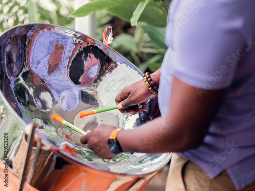 A steel drum player in Barbados, Caribbean photo