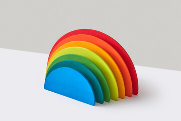 Constructor rainbow wooden hemispheres.