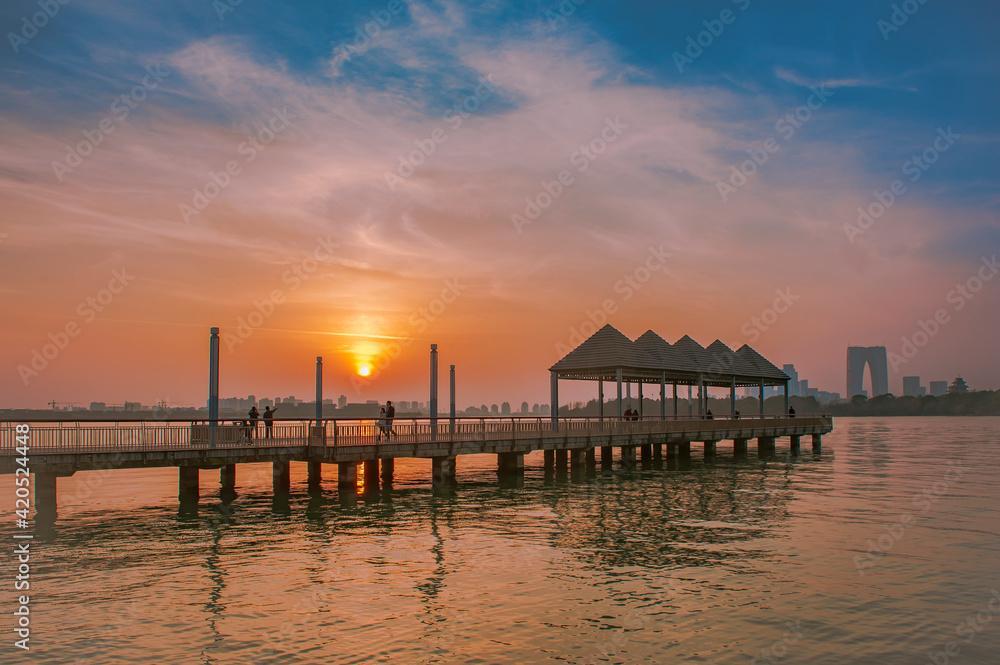 sunset over the city or lake sunset over the city or lake
