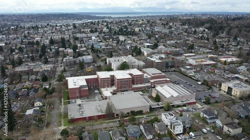 Cinematic aerial drone dolly footage of Wallingford, Freemont, Meridian, Green Lake, Phinney Ridge, Northlake, Lake Union, residential Seattle neighborhoods near downtown Seattle, Washington photo