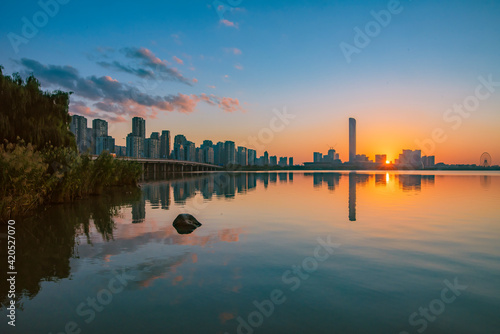 sunset over the city or lake