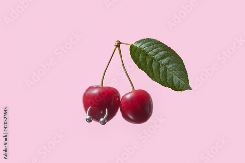 Ripe fresh cherry berries with piercing.