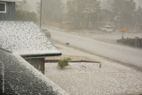 Hail is a form of solid precipitation. This hail Storm is in Colorado.  photo
