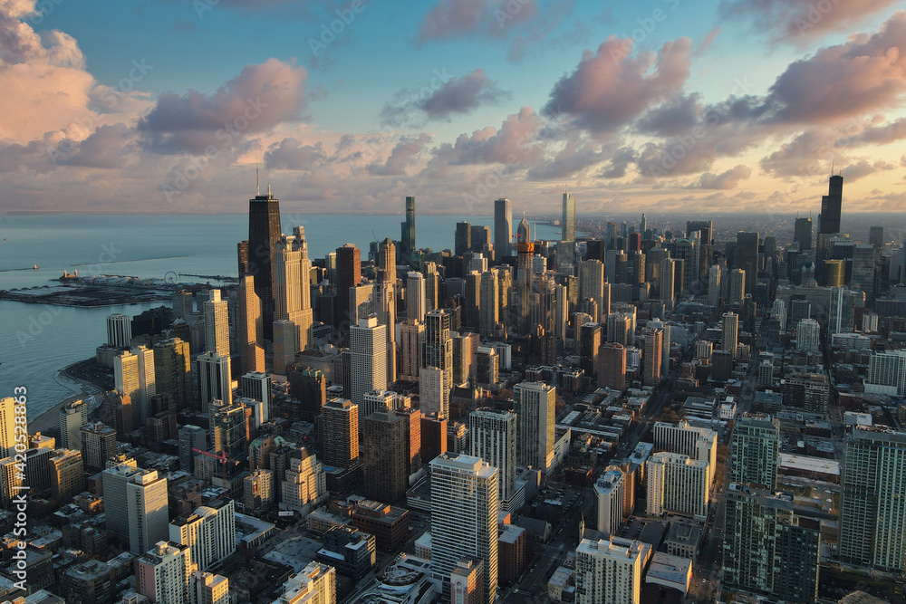 Chicago downtown aerial panorama view at sunset with skyscrapers and city skyline at Michigan lakefront with colorful cloud.