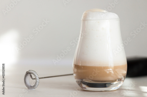 Milk foam maker. Mini blender, frothers for coffee, latte photo