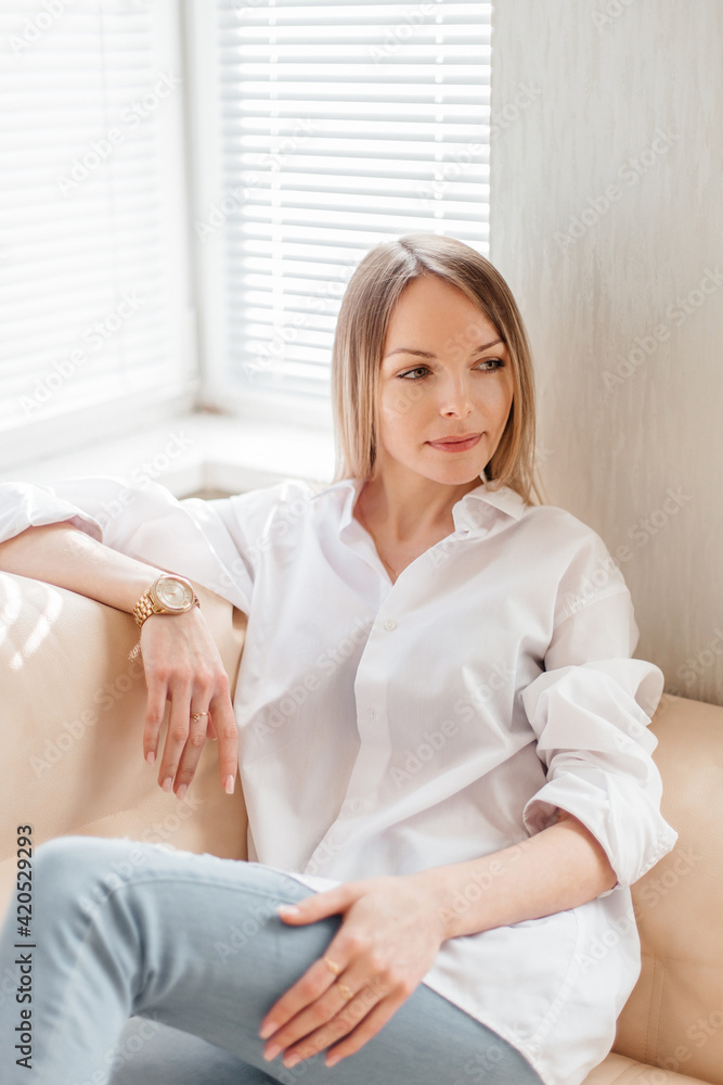 Woman indoor portrait. Young beautiful girl at home Woman indoor portrait. Young beautiful girl at home