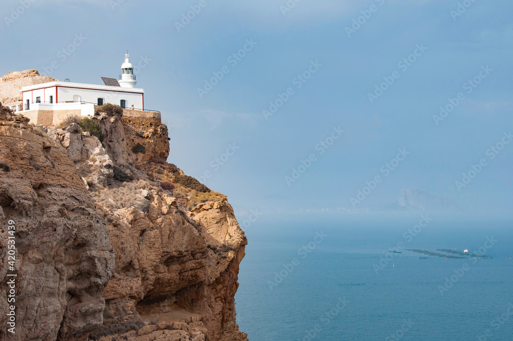 ALBIR, SPAIN - AUGUST 11, 2012: A Lighthouse and exhibition center within a marine conservation area, with sea views and clifftop trails.