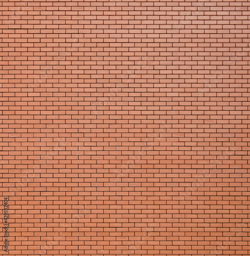 geometric and symmetrical red brick wall