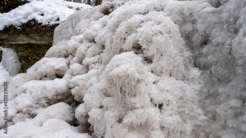 Dauda waterfall in winter. Small Frozen waterfall in Gauja national park, Sigulda, Latvia. photo