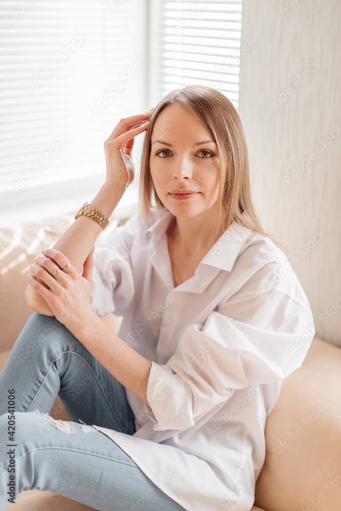 Woman indoor portrait. Young beautiful girl at home Woman indoor portrait. Young beautiful girl at home