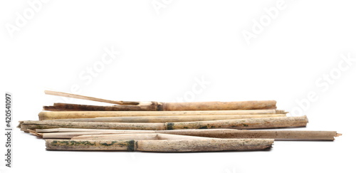 Dry cane branches, pile old reed for fire isolated on white background