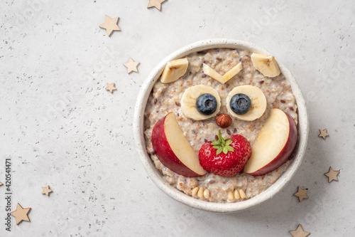 Cute owl shaped breakfast healthy oatmeal porridge for kids photo