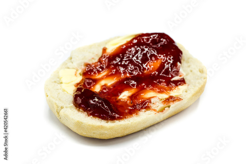 Bun with jam isolated on white background