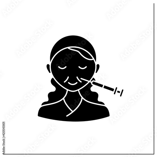 Botox injection glyph icon.Injection above upper lip. Lips lifting.Rejuvenation. Full syringe. Beauty cosmetic procedure concept.Filled flat sign. Isolated silhouette vector illustration