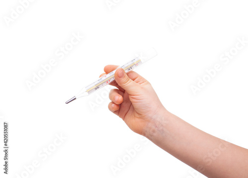 Hand holds a thermometer on a white background