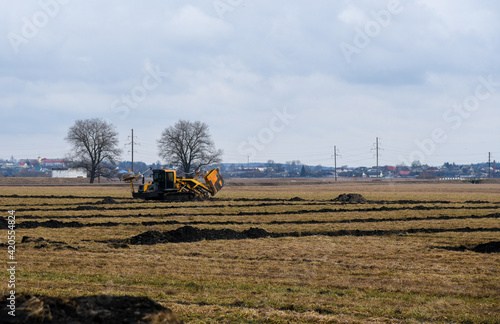 Wallpaper Mural Equipment for the construction of drainage in the field Torontodigital.ca