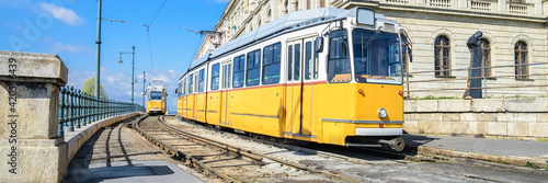 Historic yellow trams in central Budapest