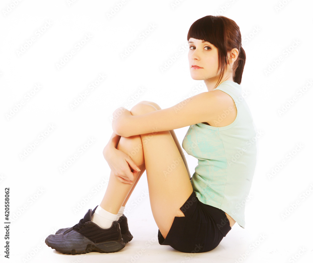 Young happy woman doing fitness Young happy woman doing fitness