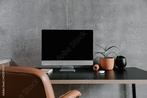 Modern workplace with computer monitor photo