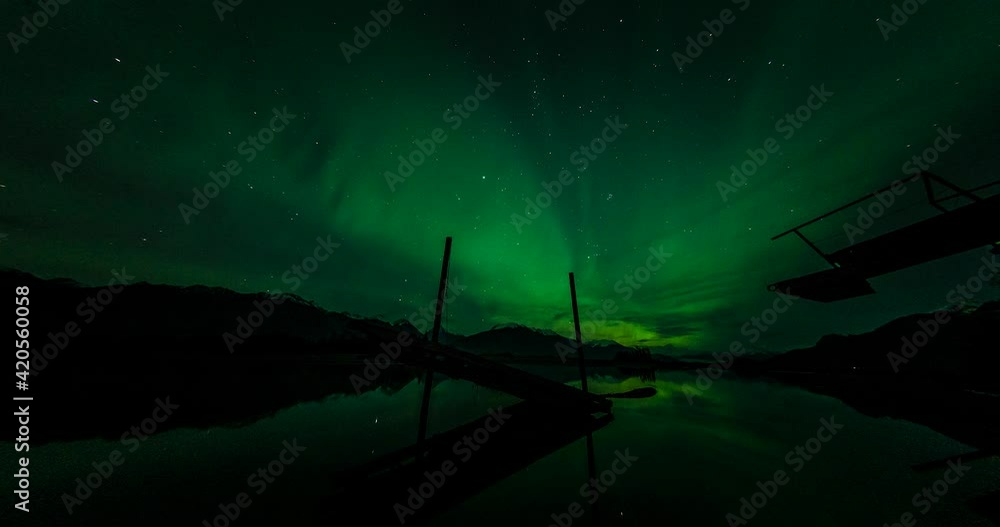 aurora borealis over river with broken dock aurora borealis over river with broken dock