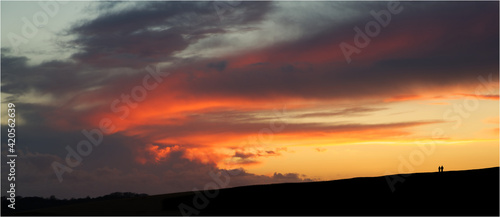 couple at sunset enjoying the view