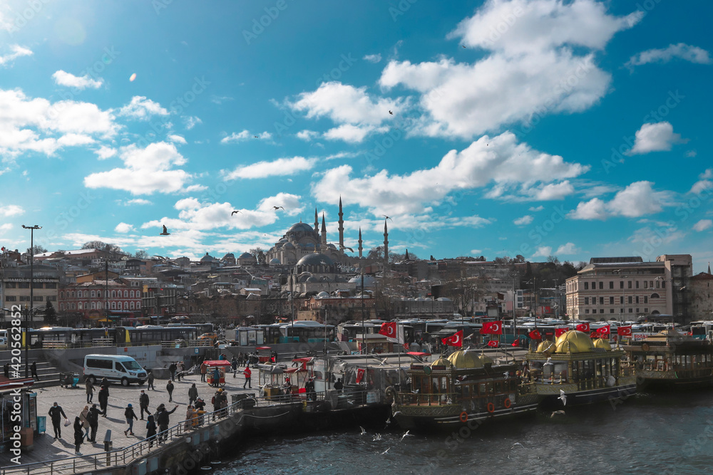 (Istanbul - Turkey 16.February.2021) - Eminönü square is a popular place in Istanbul. Itinerant vendors and across from the Süleymaniye mosque built by Mimar Sinan between 1551 and 1557.
