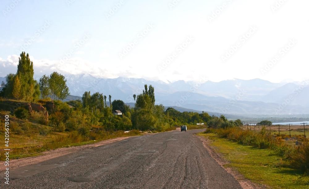 Beautiful mountains in Kyrgyzstan. Landscape with mountains at Kyrgyzstan on sunny day. Road in the Tien Shan mountain gorge