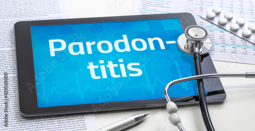 Ein Tablet mit dem Text Parodontitis auf dem Display