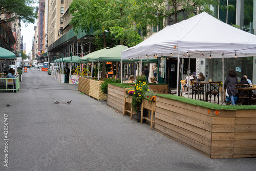 New York, USA - October 10 2020: An outdoor restaurant in midtown Manhattan. Covid outdoor dining photo