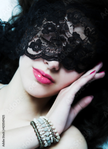 Girl with lace mask.