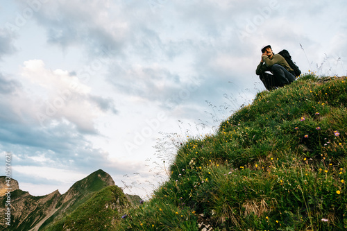Male Hiker On Mountain Top