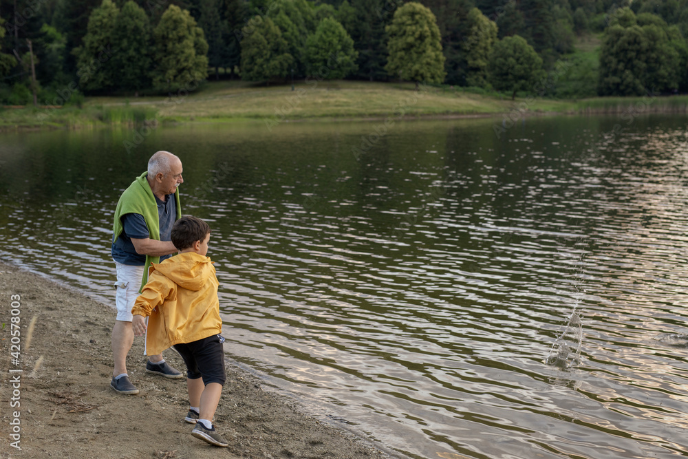 A Grandfather spending time with His Grandchild A Grandfather spending time with His Grandchild
