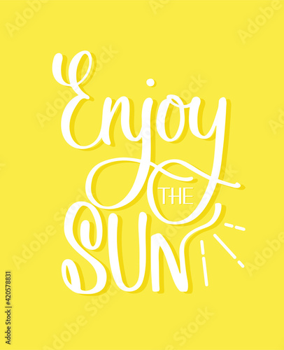 Enjoy the Sun hand lettering quote. Calligraphy design for sun protection cosmetic  travel poster. Good for card  banner and ads.