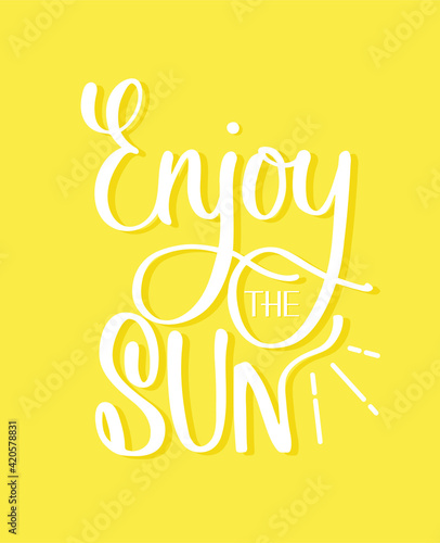 Enjoy the Sun hand lettering quote. Calligraphy design for sun protection cosmetic, travel poster. Good for card, banner and ads.