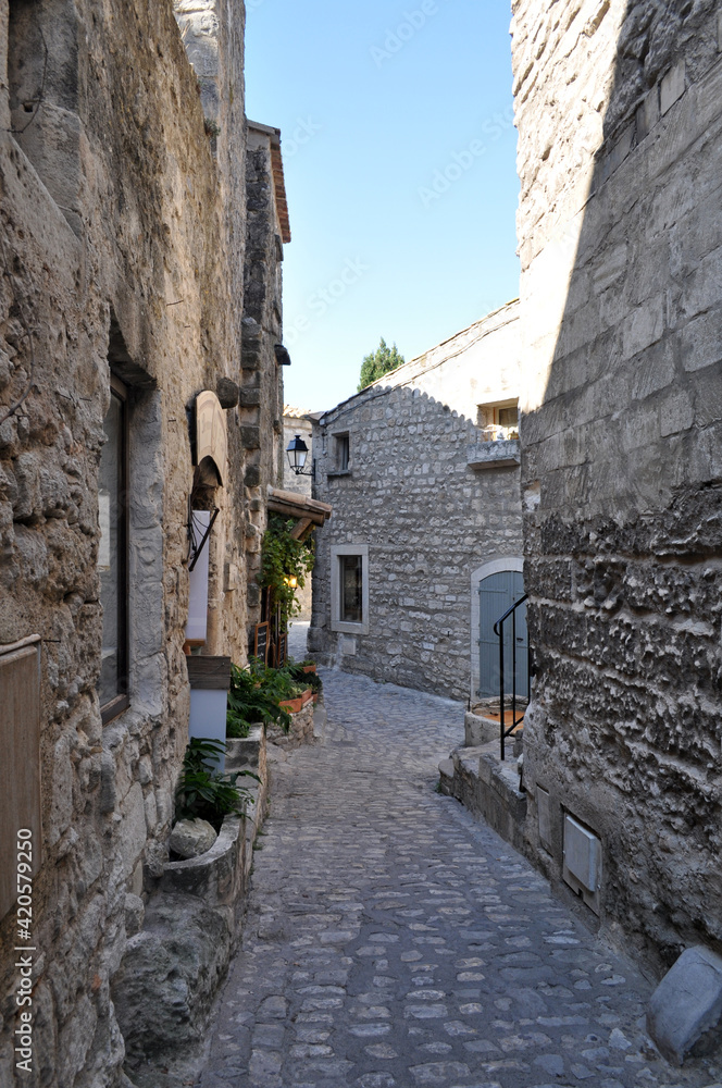 Old stone alley in a small town in the south of France - Les-Baux-de-Provence, France