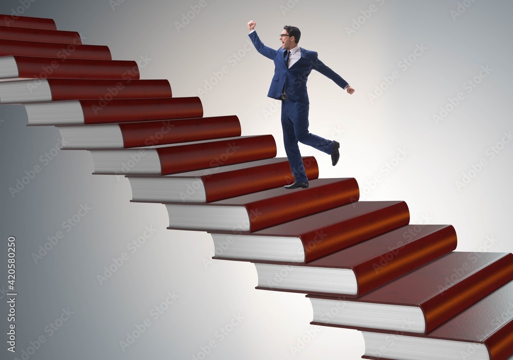 Businessman student climbing the ladder of education books Businessman student climbing the ladder of education books