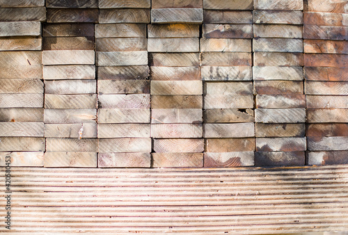 Closeup of stacks of lumber and plywood photo