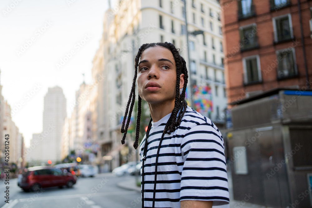 Young Black Boy Walking On The Streets. Stock Photo Adobe Stock