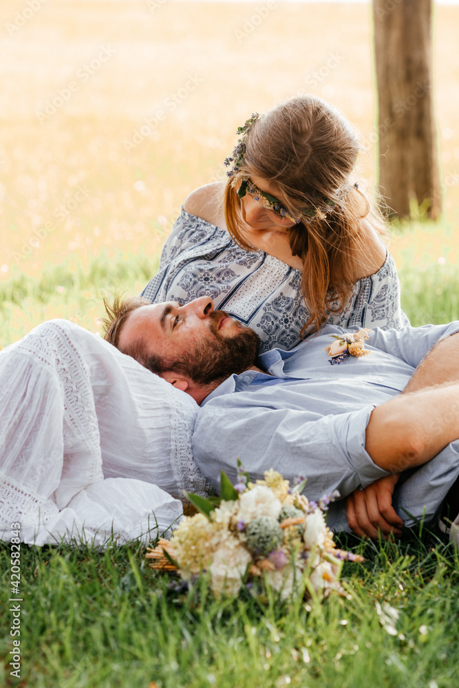 Eclectic rustic wedding couple. Intimate ceremony at backyard Eclectic rustic wedding couple. Intimate ceremony at backyard