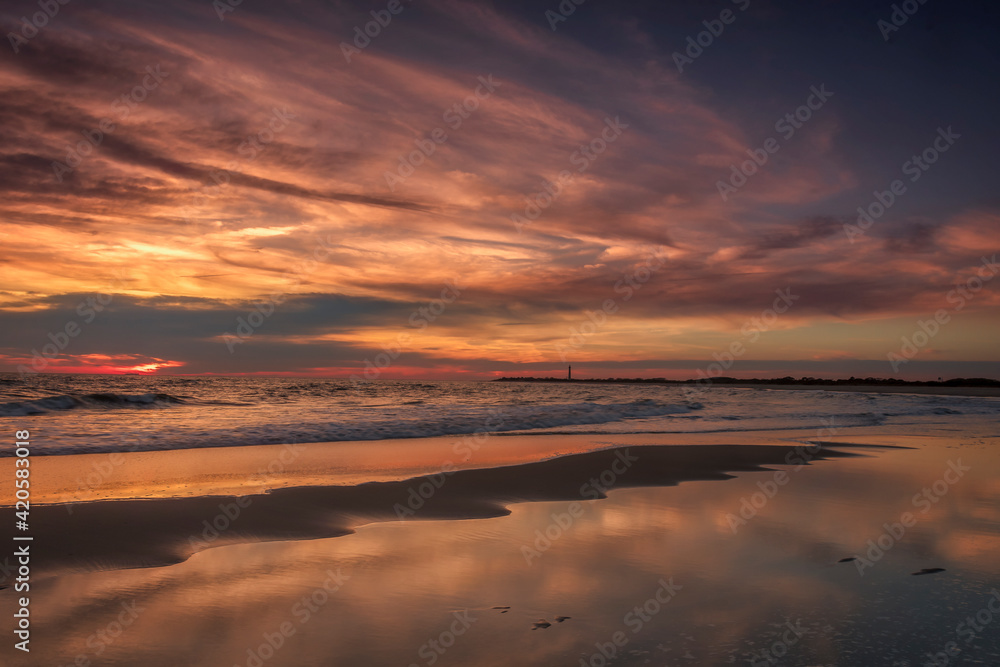 USA, New Jersey, Cape May National Seashore. Sunset on ocean shore.