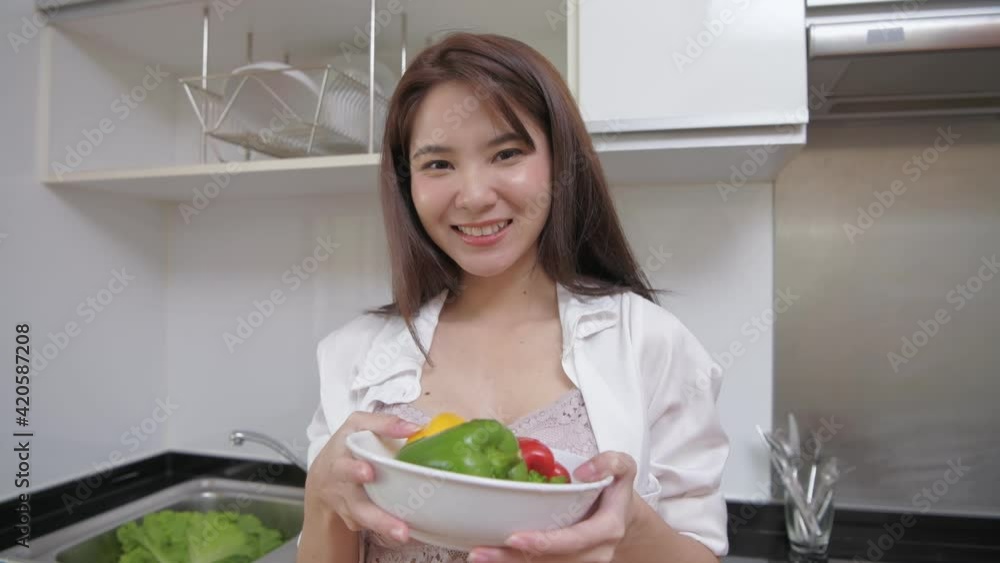 Health concept of 4k Resolution. Asian girls are recommending to eat fruits and vegetables. Health concept of 4k Resolution. Asian girls are recommending to eat fruits and vegetables.