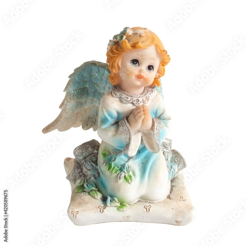 angel statue isolated on white background. Figurine of an angel on a white background. Ceramic angel isolated. 